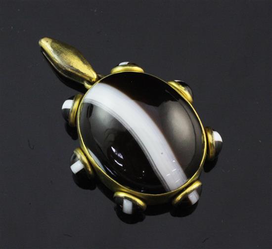 A 19th century gilt metal mounted banded agate pendant locket, 2.25in inc. bale.